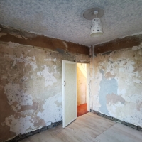 Wallpaper stripping and wall repair